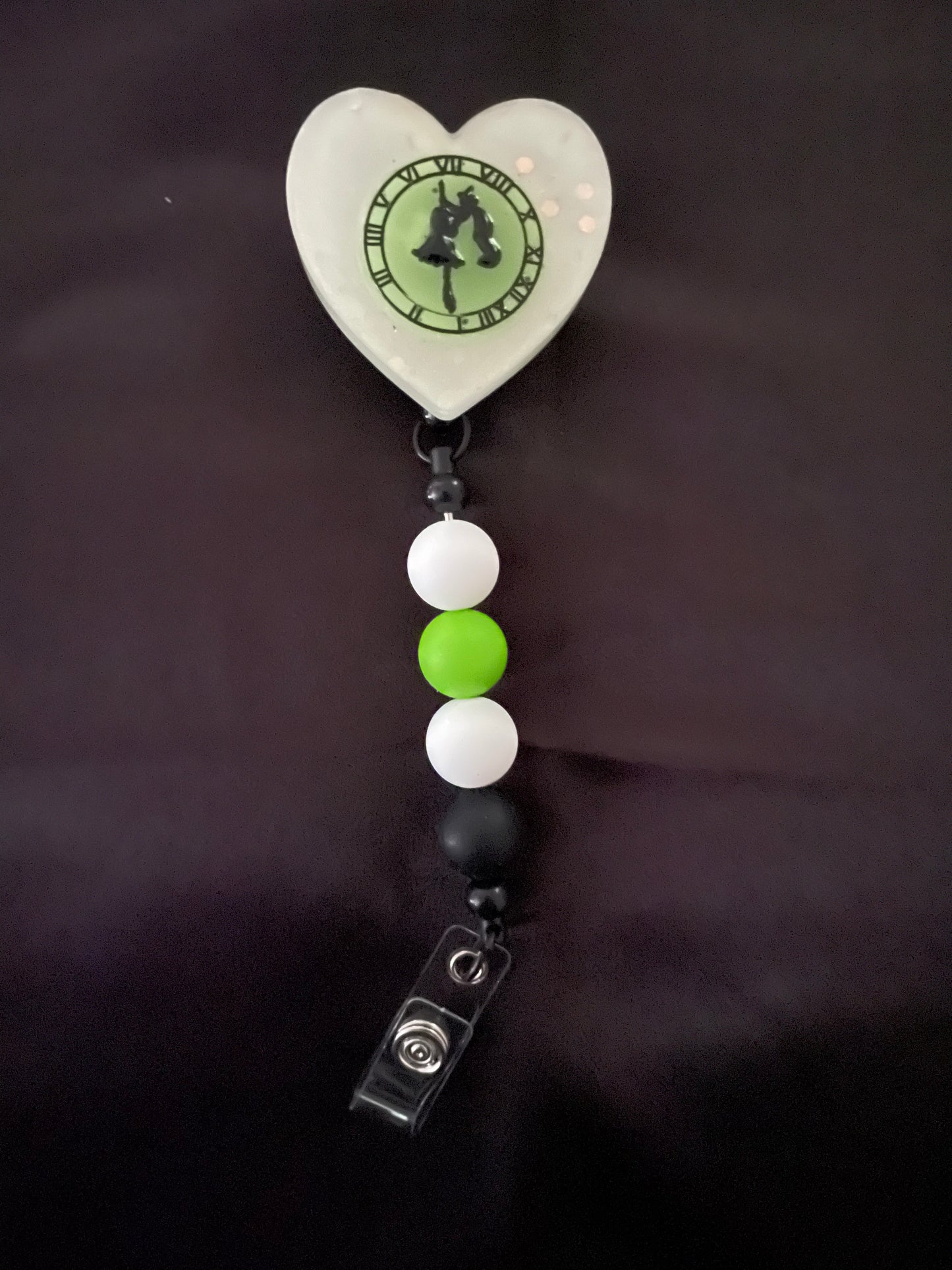 Wicked themed badge reels