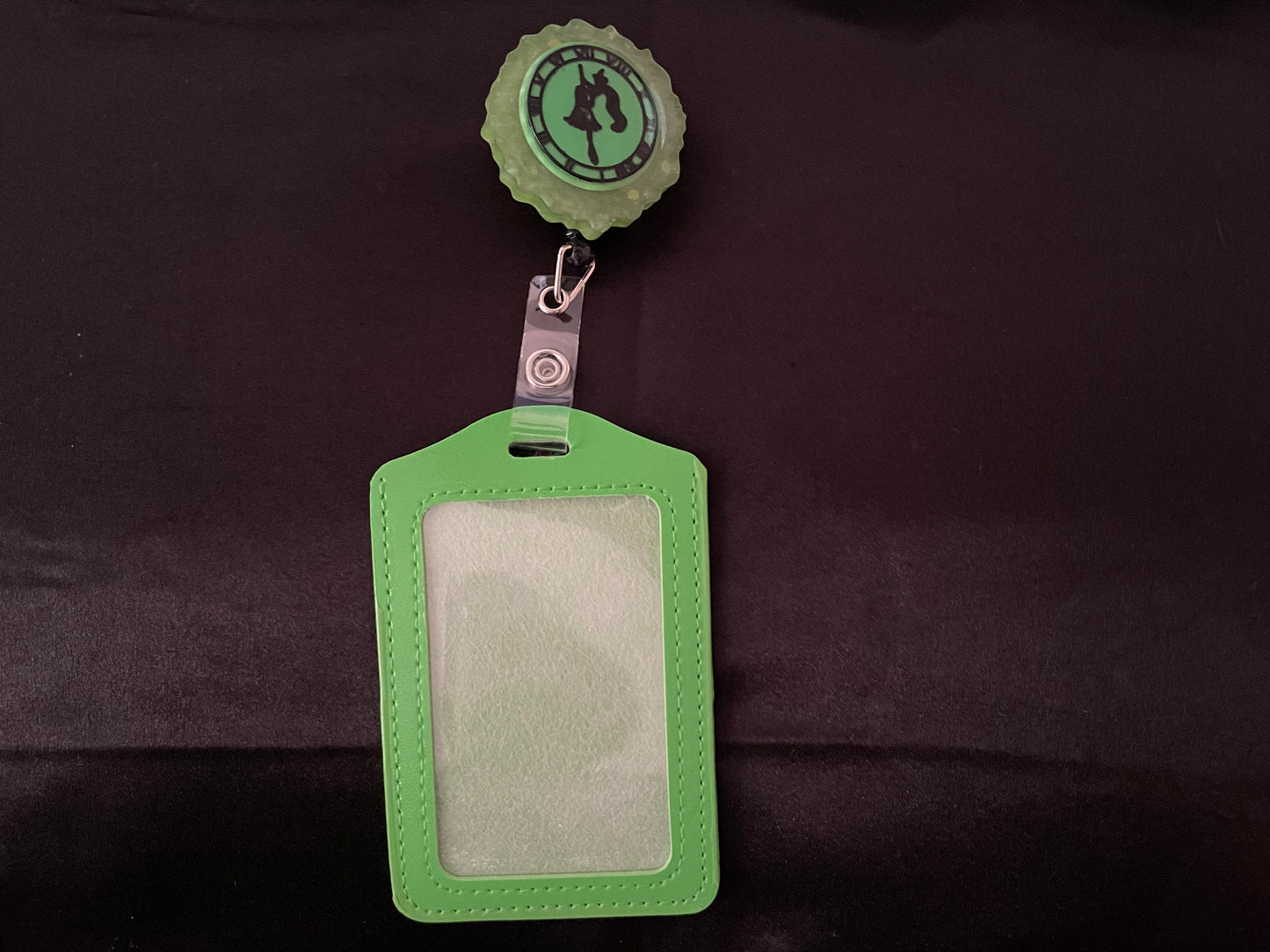 Wicked themed badge reels