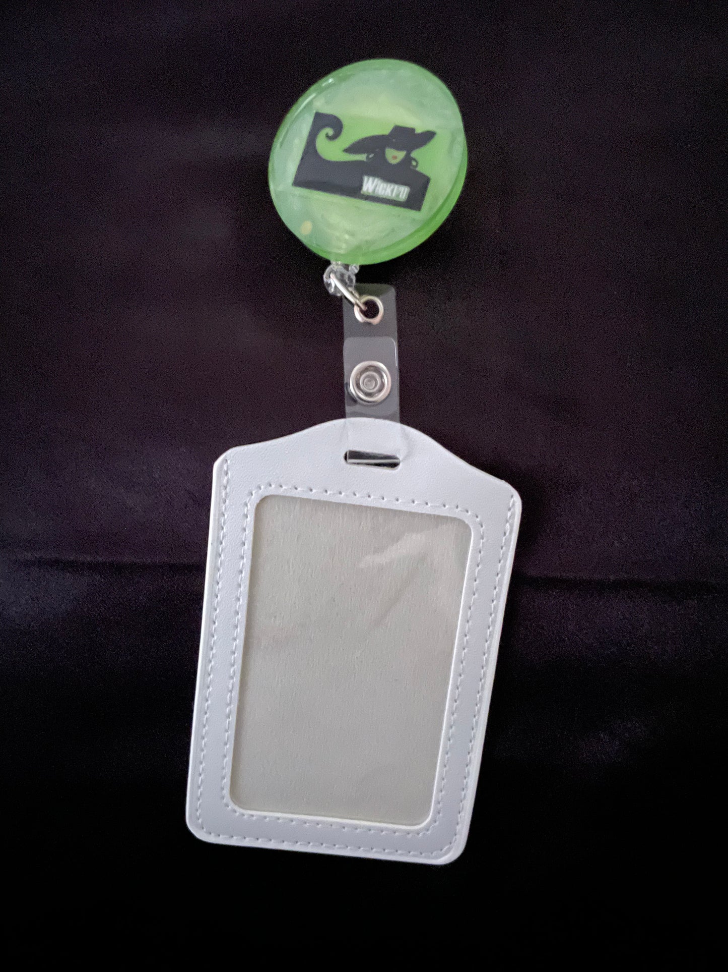 Wicked themed badge reels