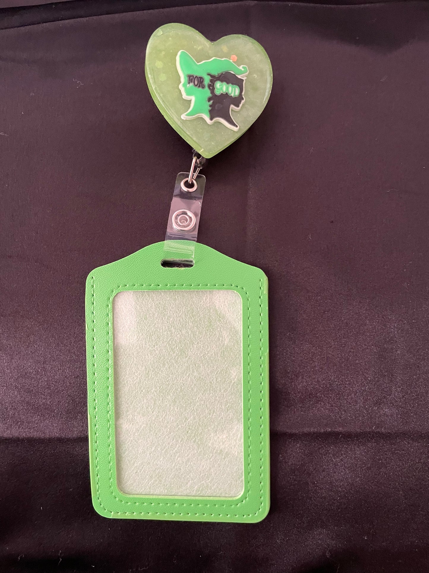 Wicked themed badge reels